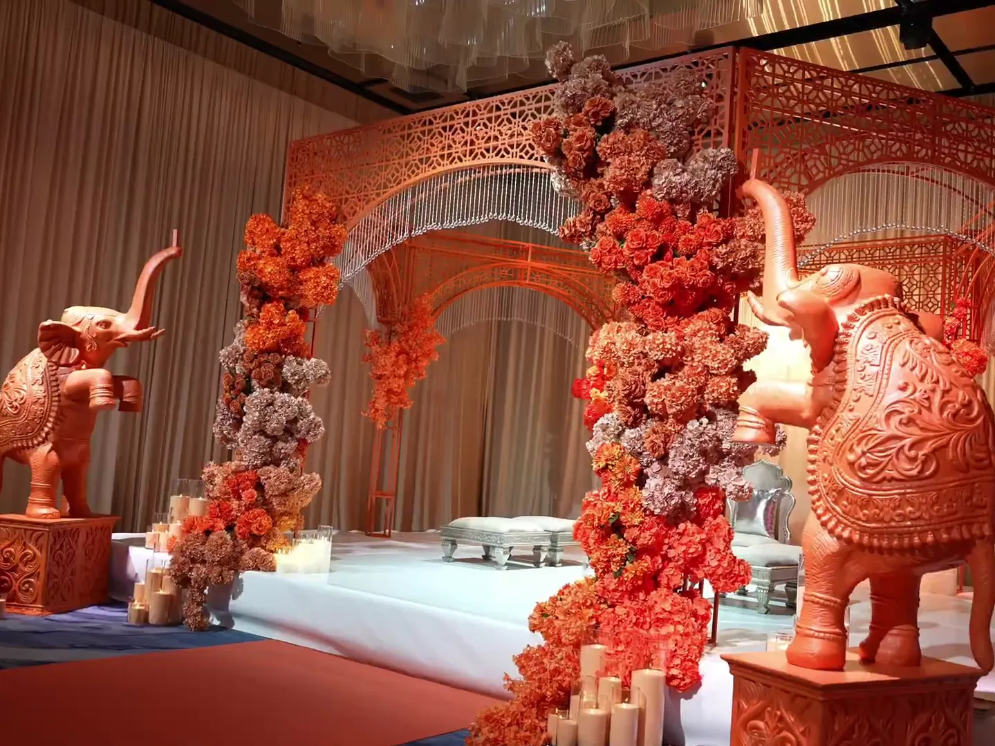 A floral mandap installation at the Wedded World Showcase