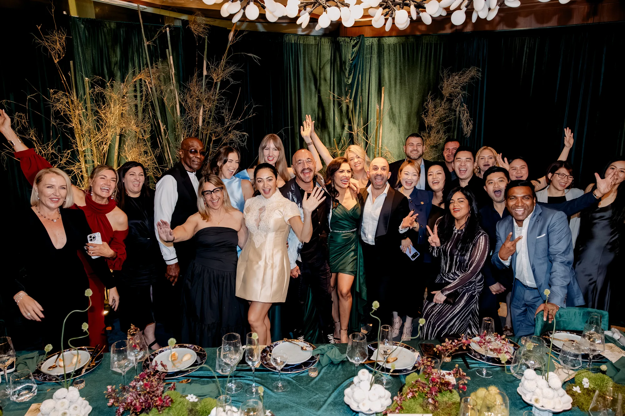 Experience with Wedded guests gathered around a styled dinner table