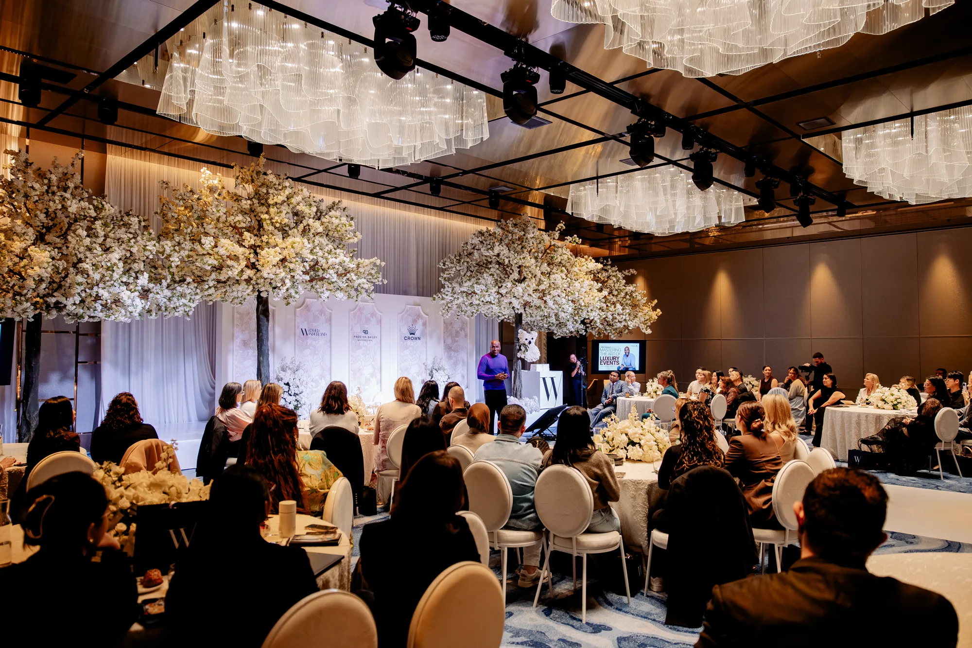 The Wedded Wonderland Summit ballroom during a keynote session